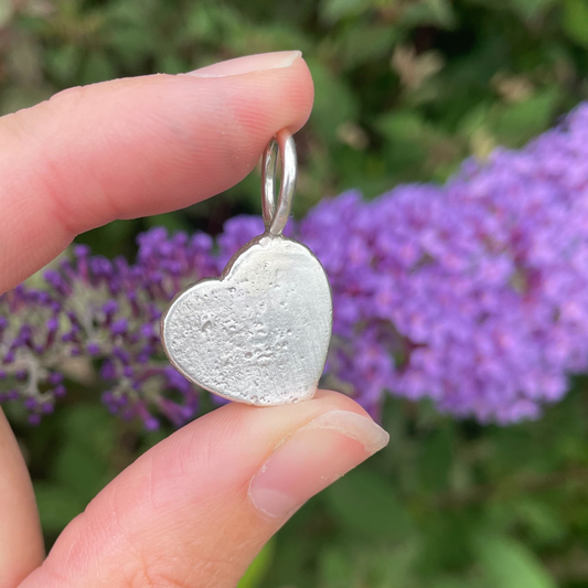 one of a kind small silver heart sandcast charm