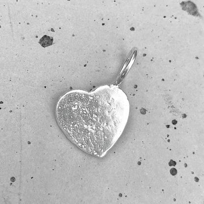 one of a kind small silver heart sandcast charm