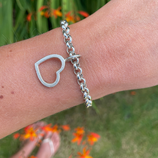 small sandcast open heart handmade heavy silver charm bracelet