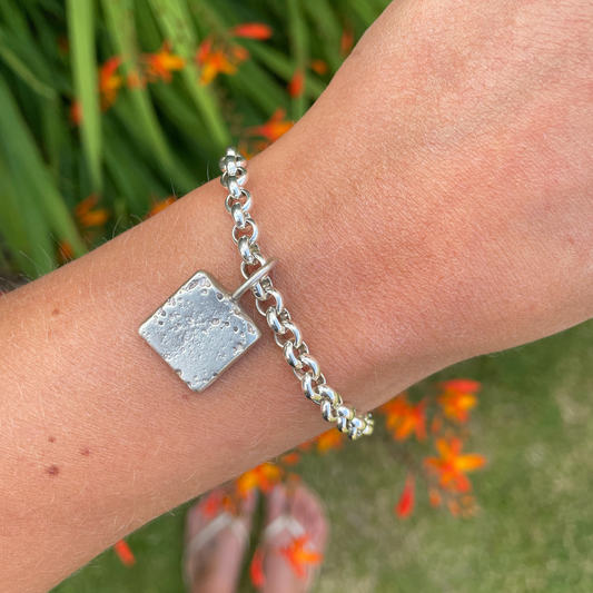 small sandcast solid silver square charm bracelet