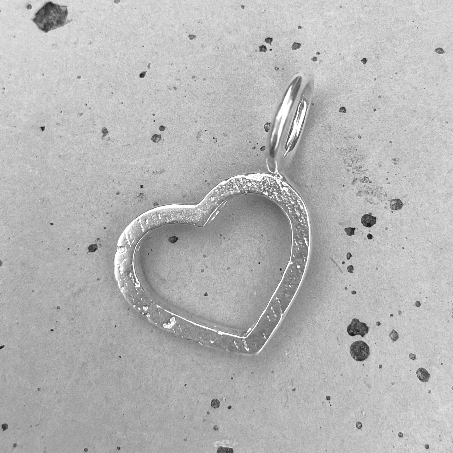 small solid silver open heart sandcast charm