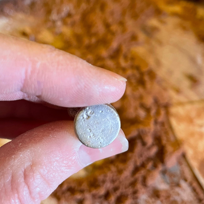 textured small round sandcast pendant charm