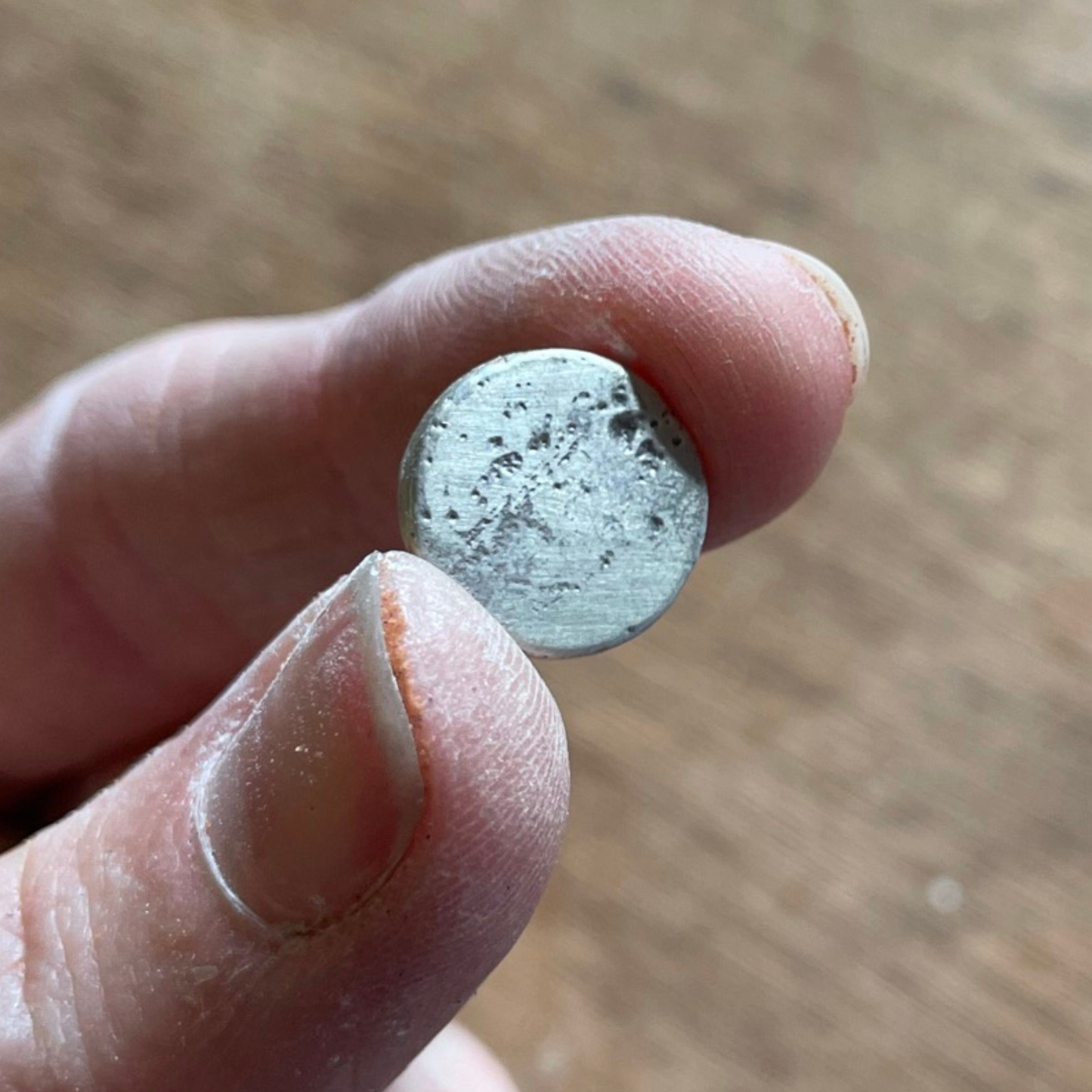 textured small round sandcast pendant charm