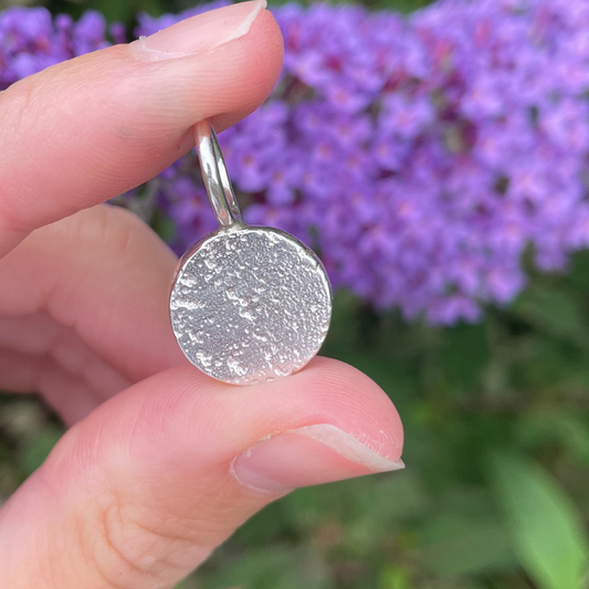 textured small round sandcast pendant charm